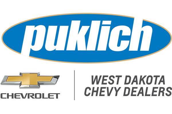Puklich Chevrolet logo featuring the word “puklich” in bold white letters inside a blue oval with a gold outline, above the Chevrolet gold bowtie emblem and the text “CHEVROLET | WEST DAKOTA CHEVY DEALERS.”